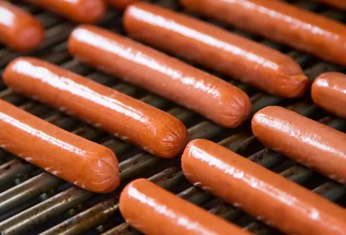 Skinless hot dogs grilled, finished product from cellulose casing