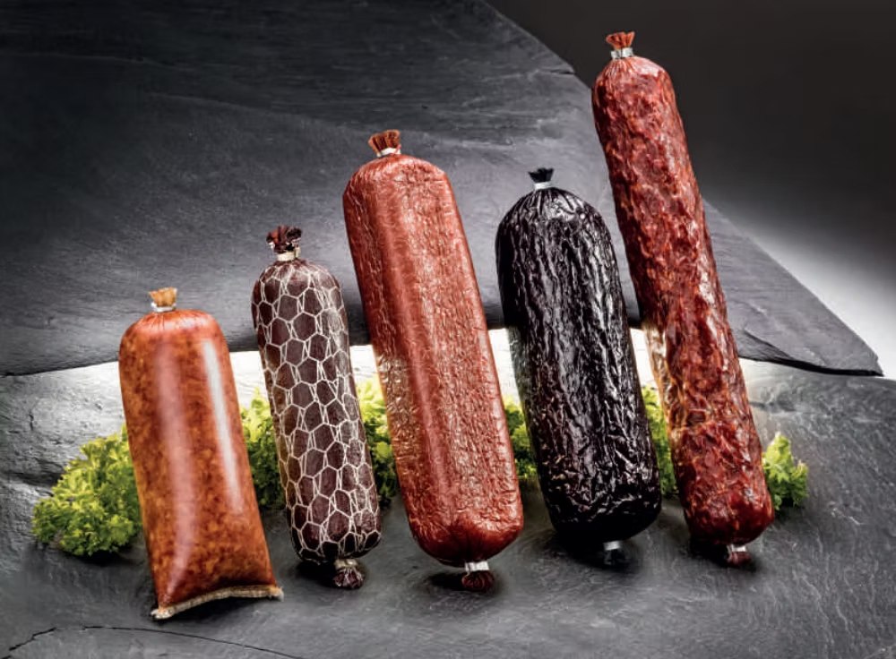 Fibrous casing rolls in multiple colors