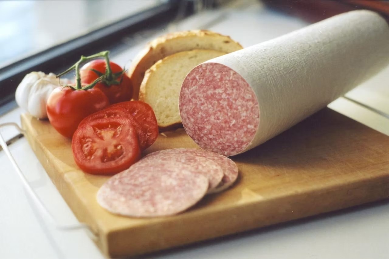 Fibrous casing summer sausages with garnish